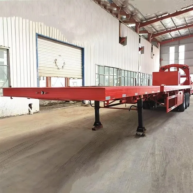 Poluprikolica s ravnim platformom sa tri osovine